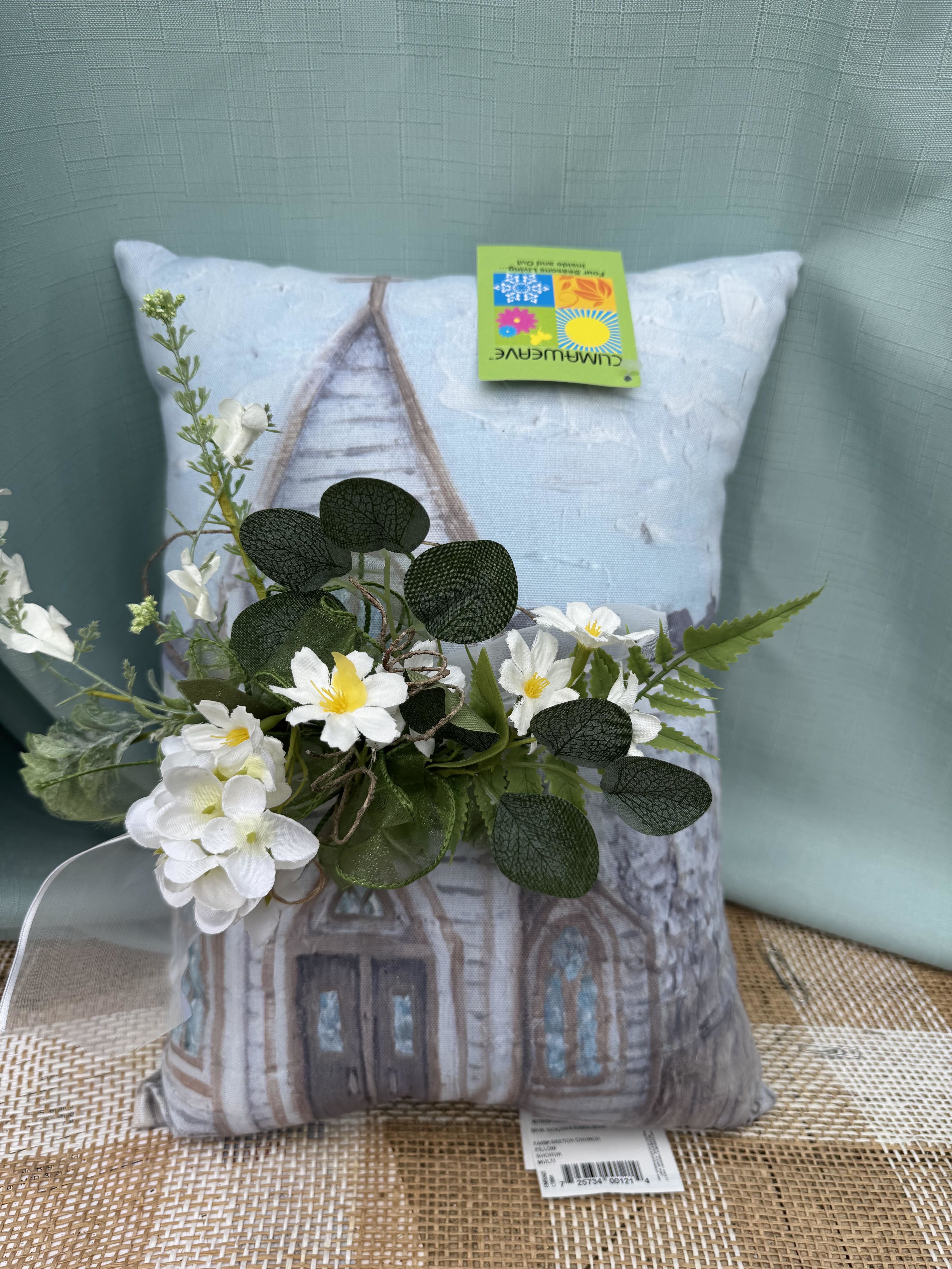 CHURCH PILLOW - A soft-colored pillow with a picture of a church and includes a white enhancement