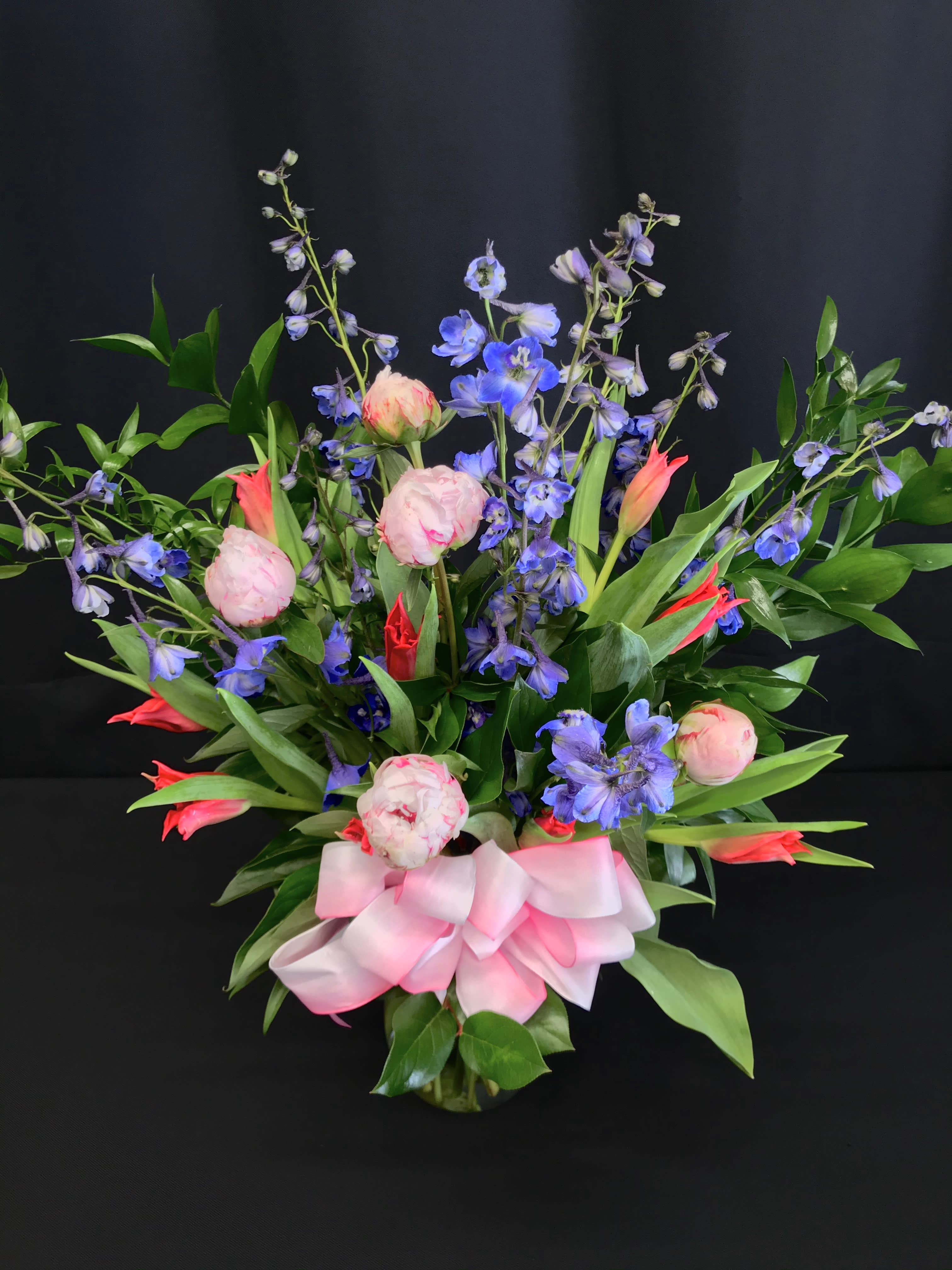 Peony Tulip bouquet  - Striking combination of tulips and peonies for a classic look. Treasured spring flowers that must be ordered well in advance. We recommend 3 weeks minimum before Mother's day so call for current availability.  Colors and flowers may vary at any time and especially with short notice.
