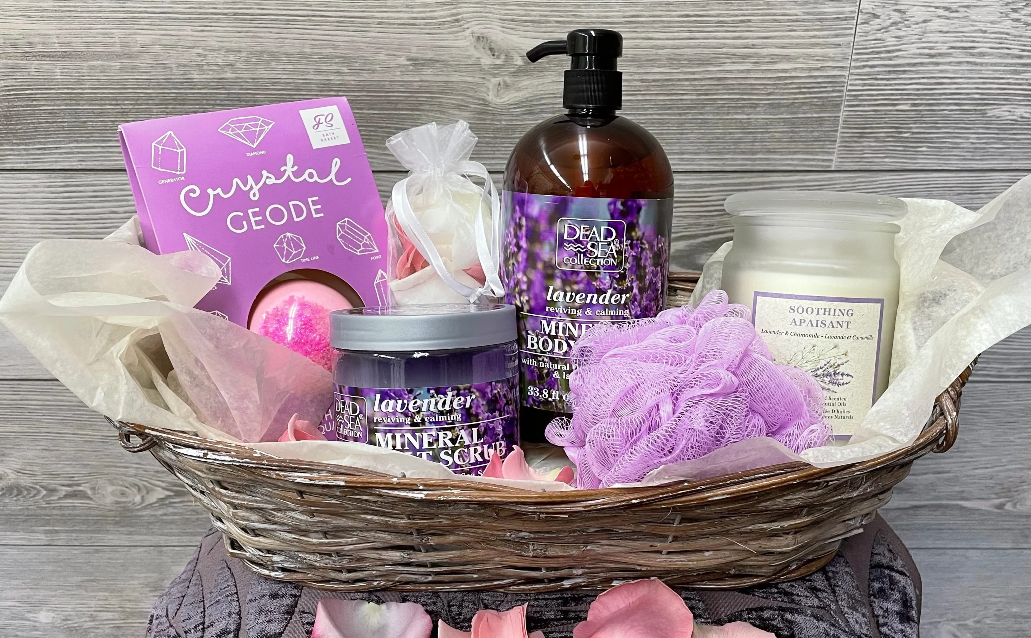 Spa gift basket with lavender bath products and a crystal geode bath bomb