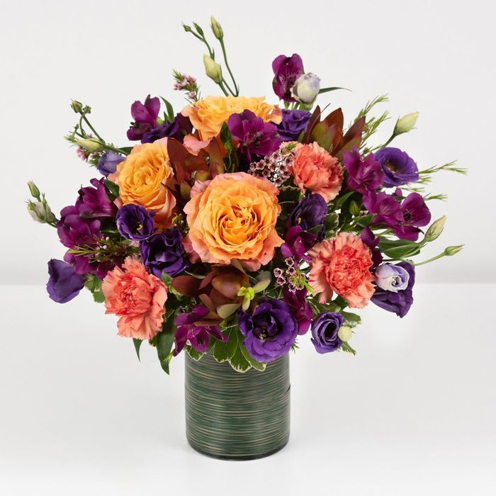 Bountiful Bouquet - Surprise a loved one with the rich beauty of these bouquet that take us through all the hues of Indian summer and autumn. The combination of warming yellows and oranges, mixed with deeper  burgundy calmly energises and uplifts, the perfect gift to transition through the season like the changing leaves.