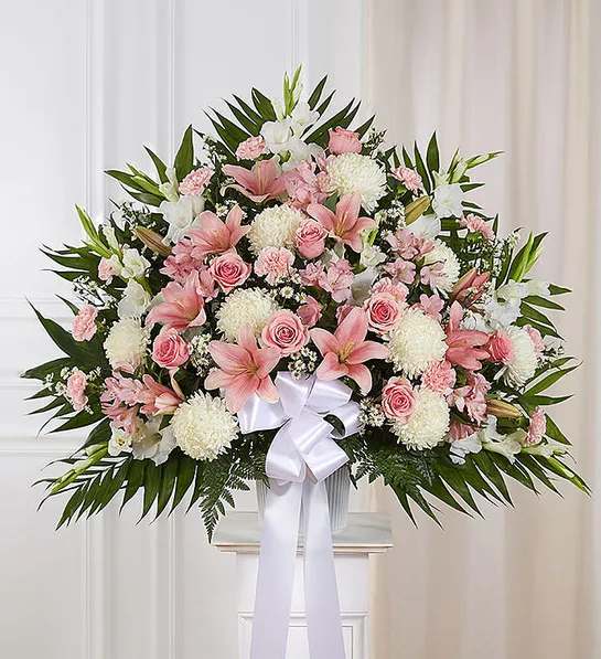 Standing Basket- Pink &amp;White - For those who are grieving, a heartfelt gesture can mean so much. Our elegant pink and white standing basket arrangement will honor the memory of a loved one in a beautiful way. Artistically designed with a medley of pink blooms, this touching expression offers comfort and support when it’s needed most.