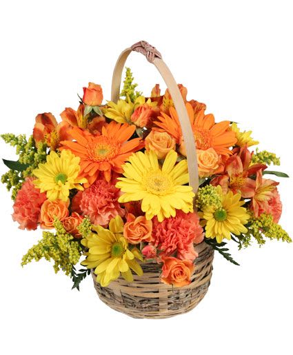 CHEERGIVER BASKET  - These gorgeous flowers are sure to make them cheer! Featuring a lovely variety of yellow poms, orange spray roses, yellow gerberas, and more, Cheergiver is sure to bring smiles to everyone who sees it. Send this bountiful basket to someone you love today! 