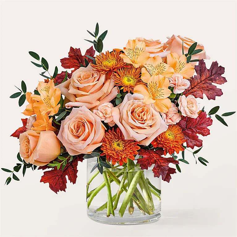 Spiced Latte Bouquet  - Like your favorite latte, this bouquet will leave your recipient feeling recharged and warm through its soothing peach hues and pops of red.