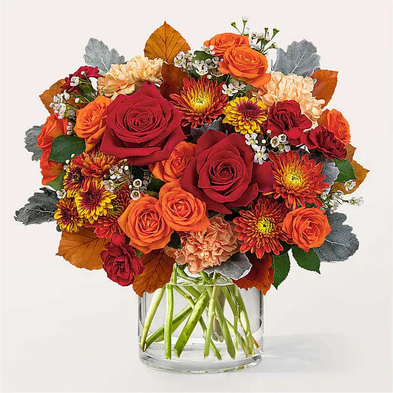 Merlot Bouquet - Rich, autumn tones are expertly arranged by your local florist to create a mesmerizing and memorable gift for someone dear.