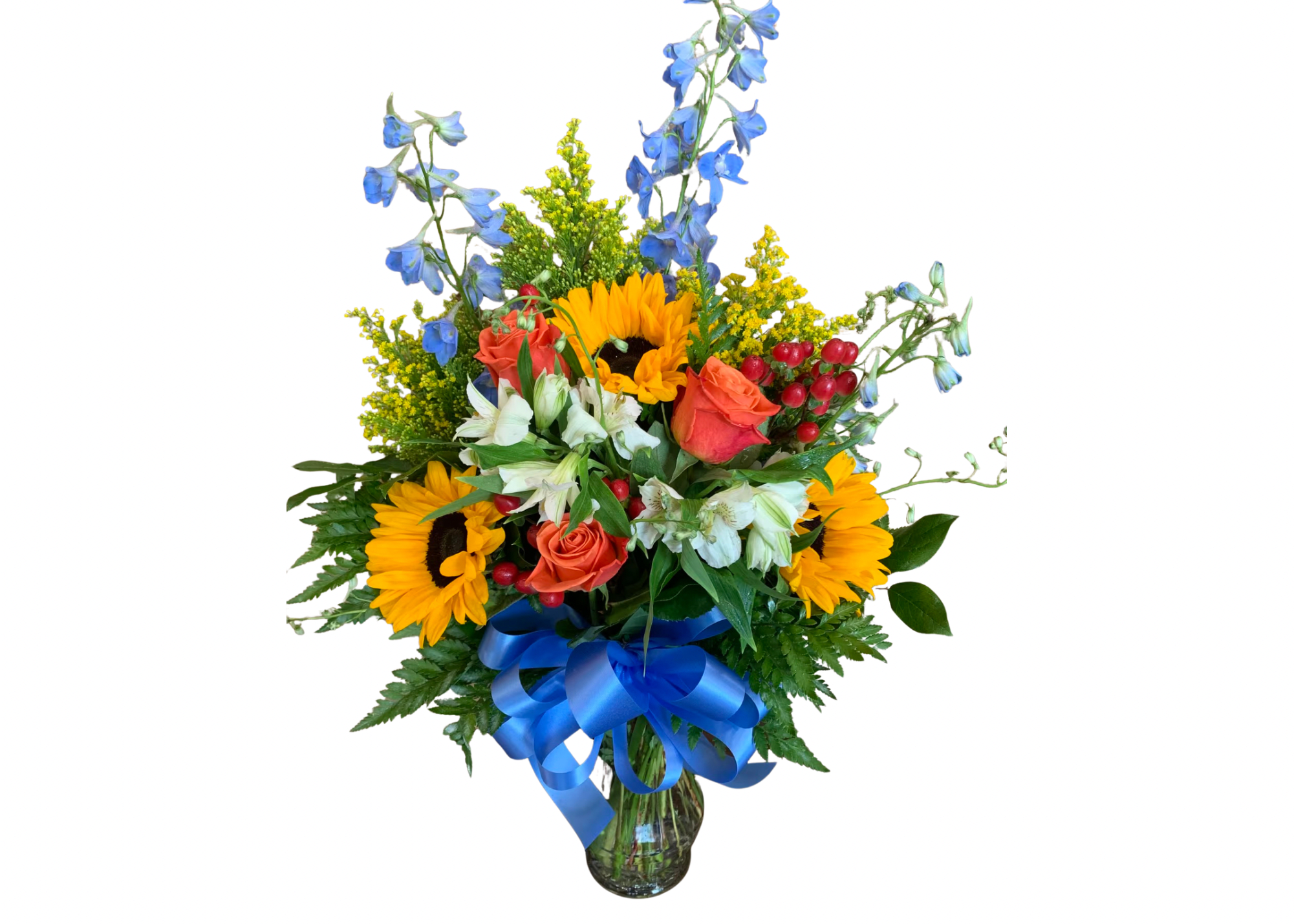 Bouquet of sunflowers, roses, and blue flowers in a glass vase with a blue ribbon