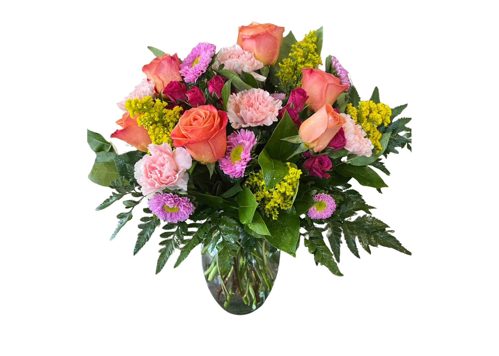 Mixed bouquet of roses, carnations, and daisies in a glass vase