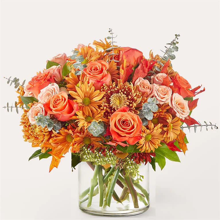 Bronze Bouquet -   Reminiscent of taking a long drive upstate, this beautiful bouquet of orange, peach and bronze florals in a seasonal is a sweet way to share your sentiments with a loved one near or far. 