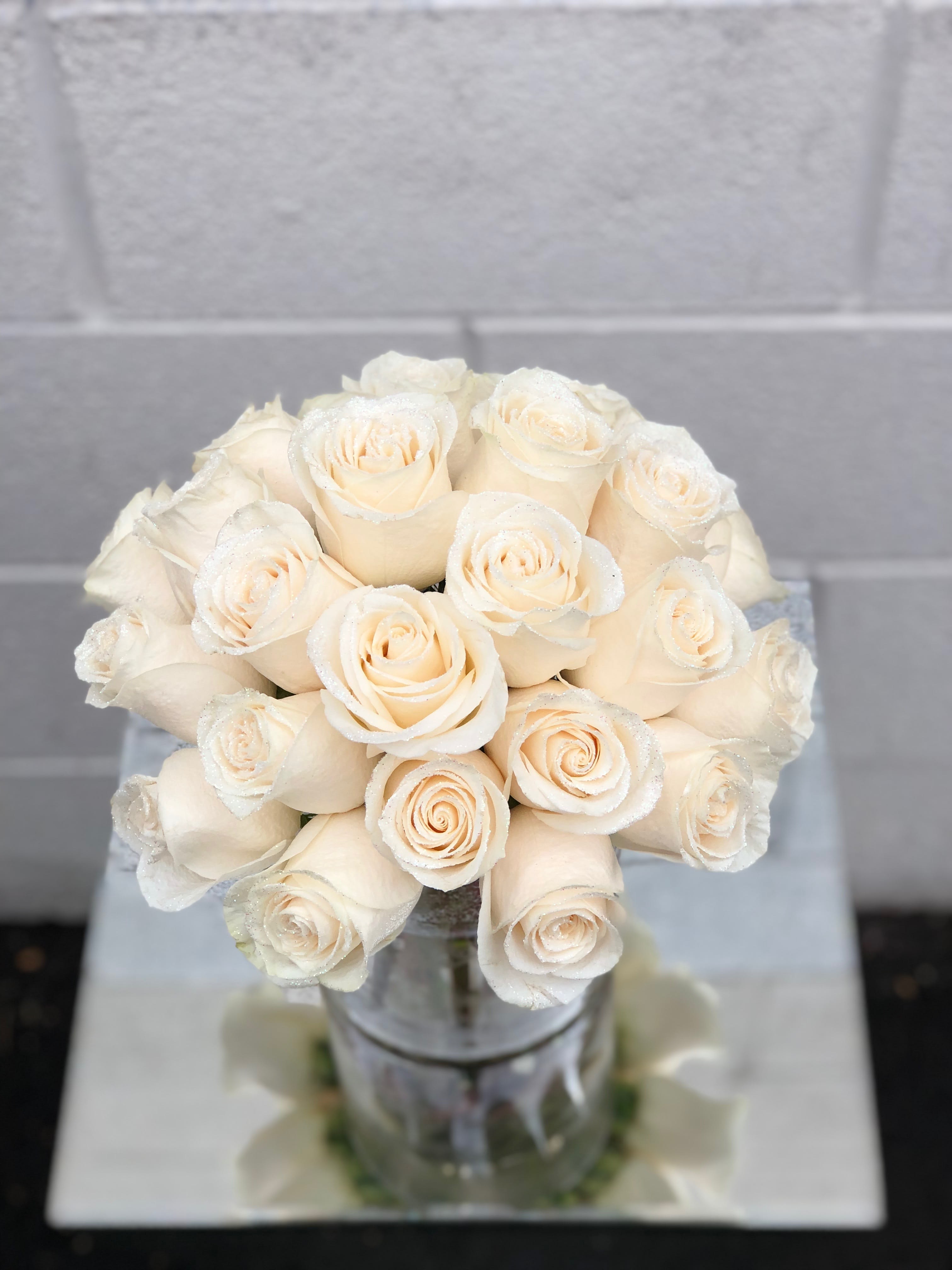 Unicorn Cloud - This glittered rose arrangement comes a glass round vase. For a glitter lover, these roses are a great alternative to classic roses! Something soft and sweet. If you'd like to request a specific color of rose or glitter, please let us know and we will do our best to accommodate.