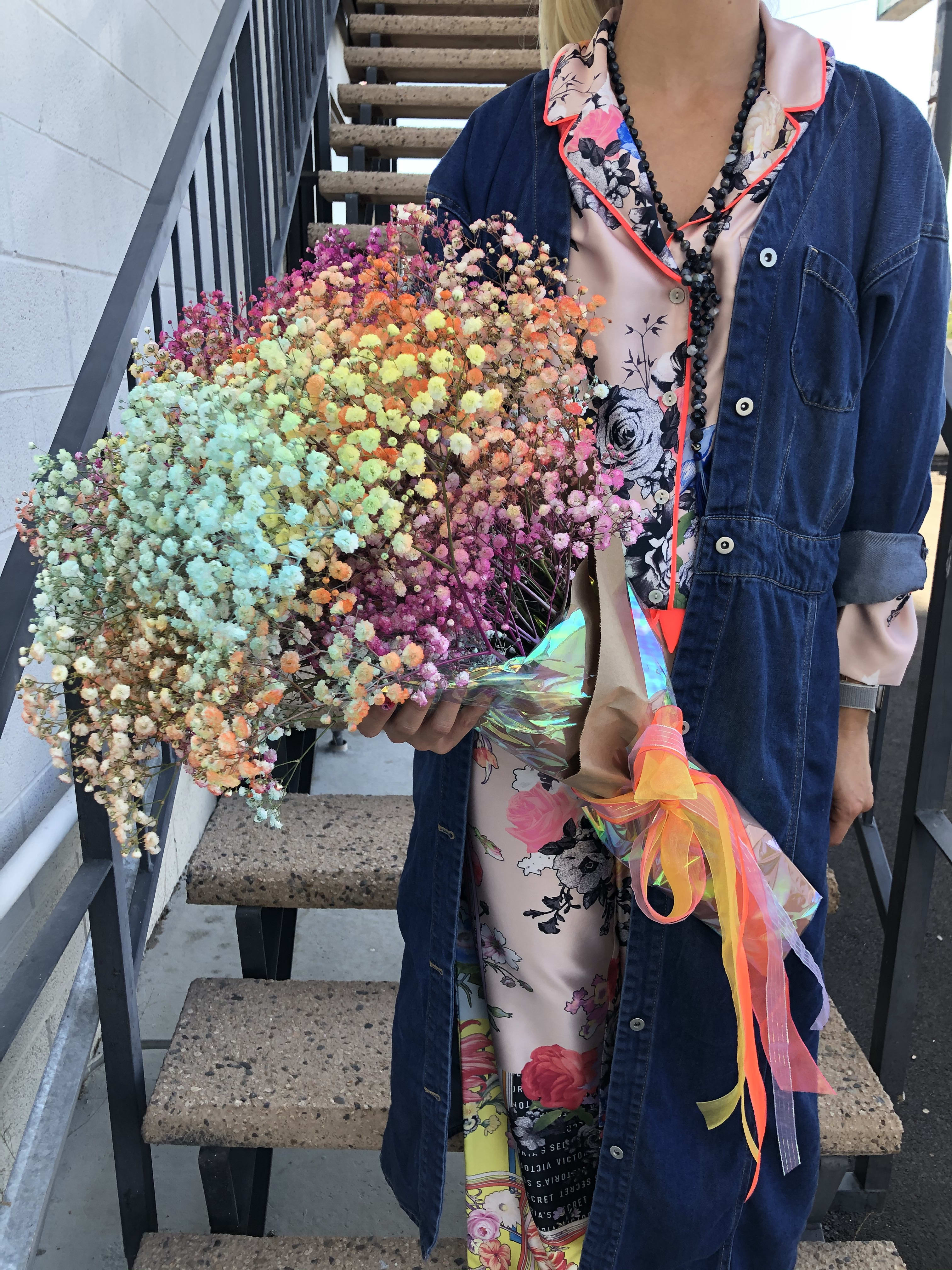 Large bouquet of multicolored baby's breath wrapped with ribbon