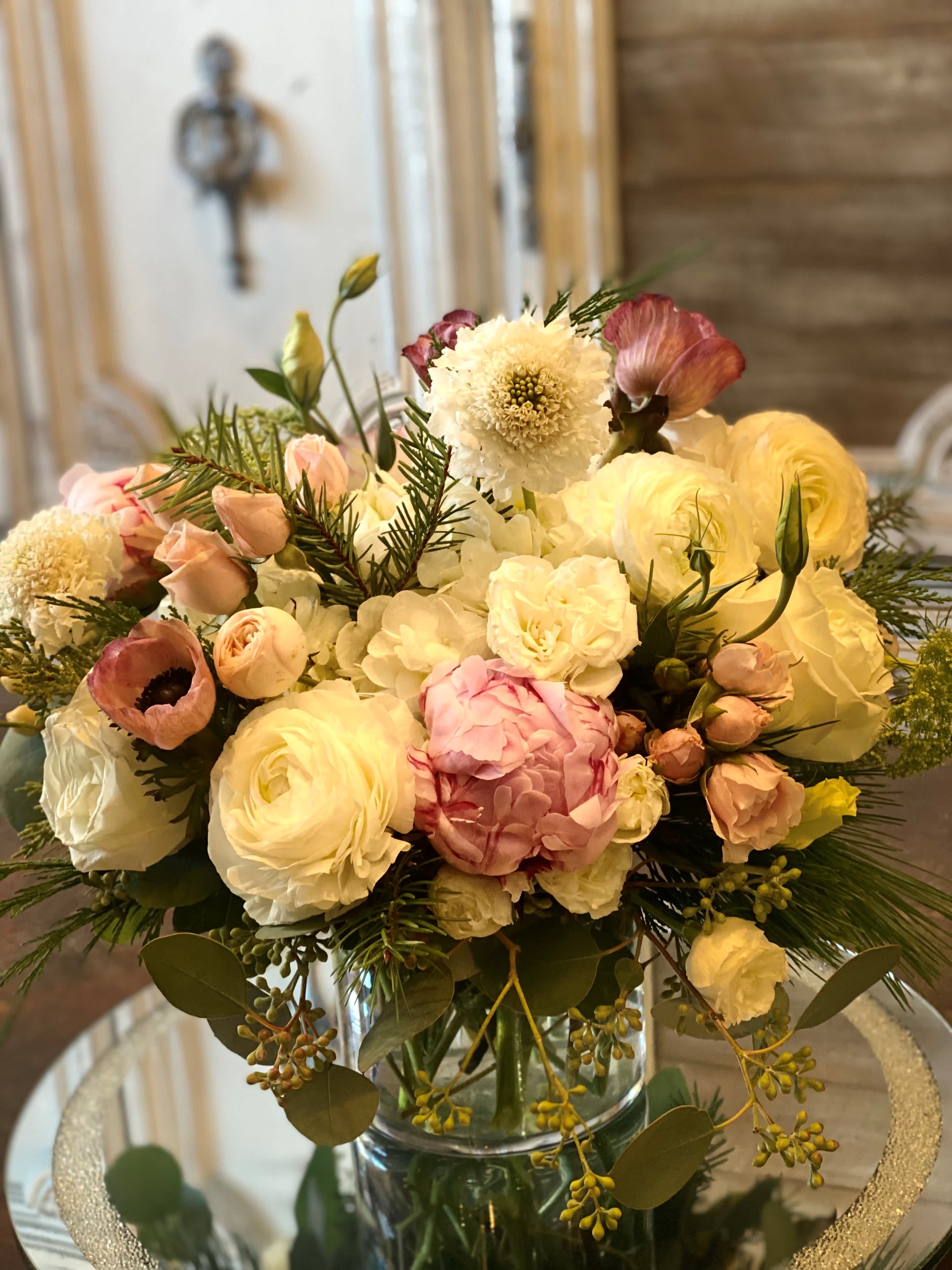 Mixed pastel bouquet in a clear glass vase