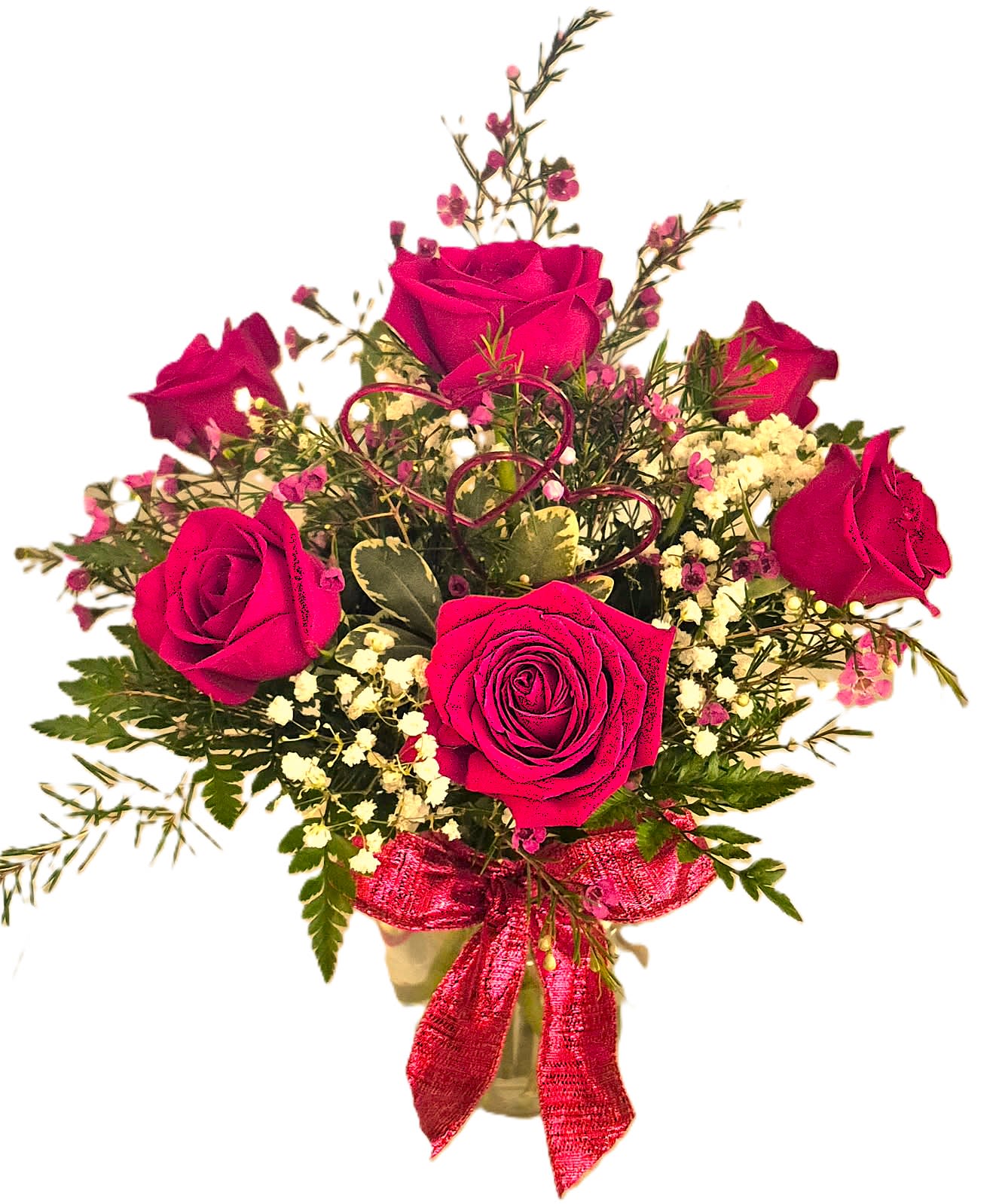 Bouquet of hot pink roses with baby's breath in a vase