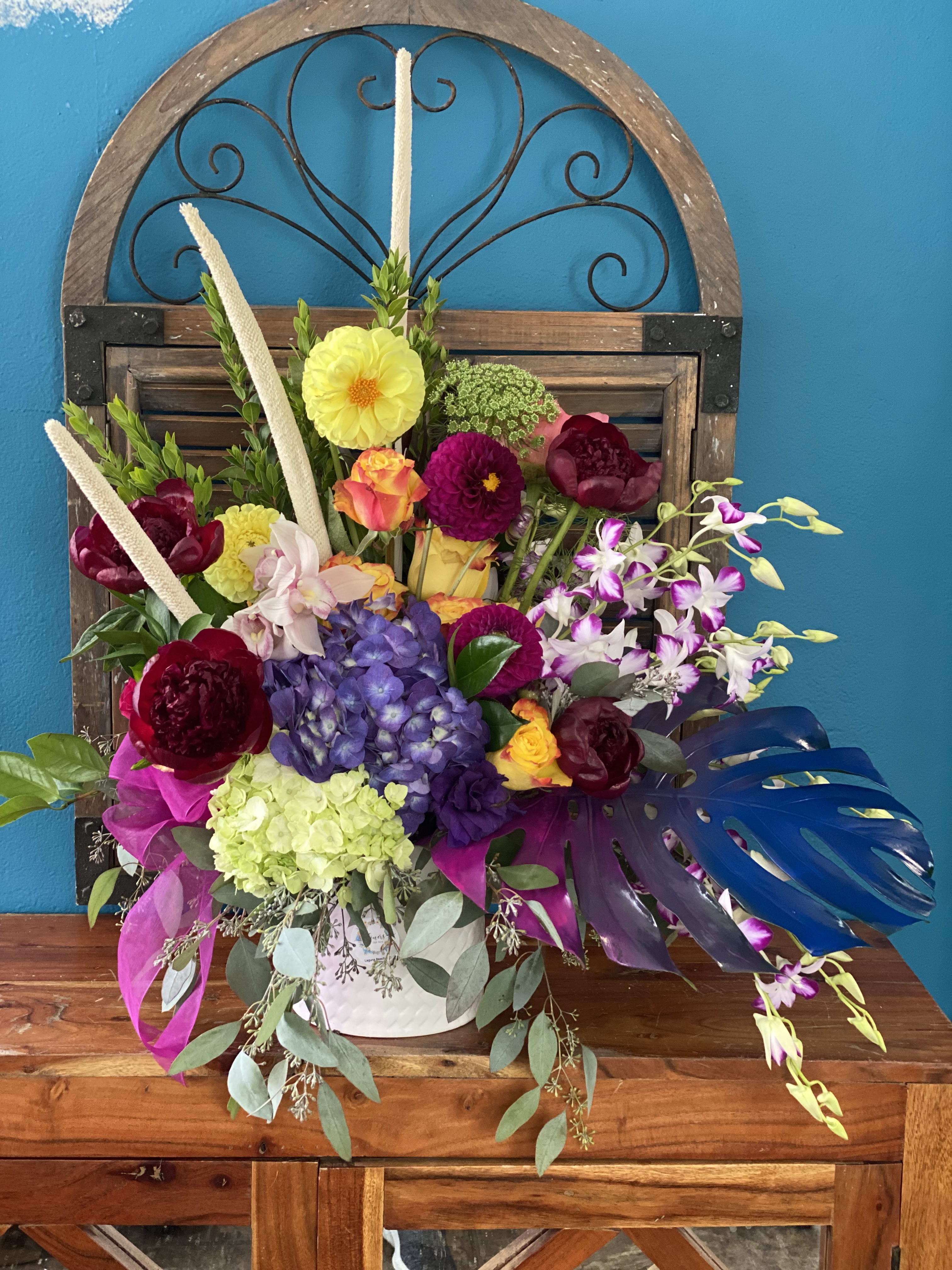 Magic in Me - A colorful arrangement with dahlias, peonies, dendrobium orchids, and antique hydrangea.