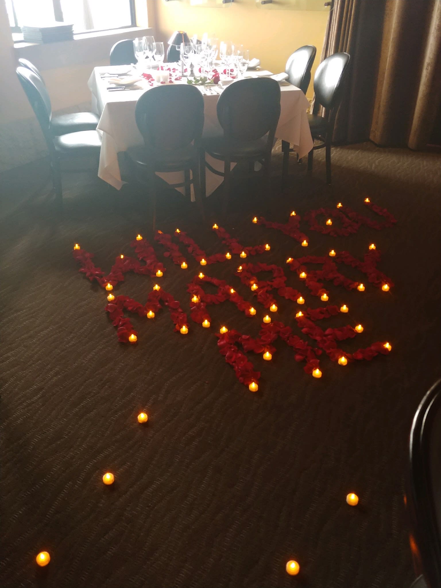 Marry Me? - A collection of candles and red roses can do all the talking for you!