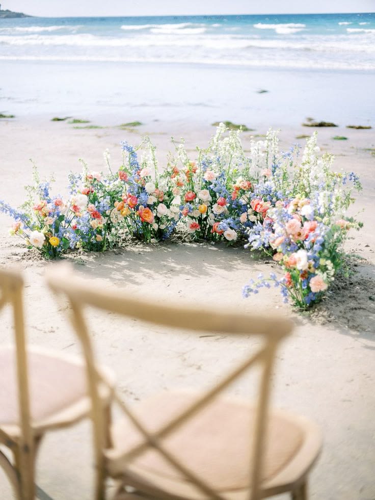 Sand and Flowers arch - Half moon arch in pastel color flowers.