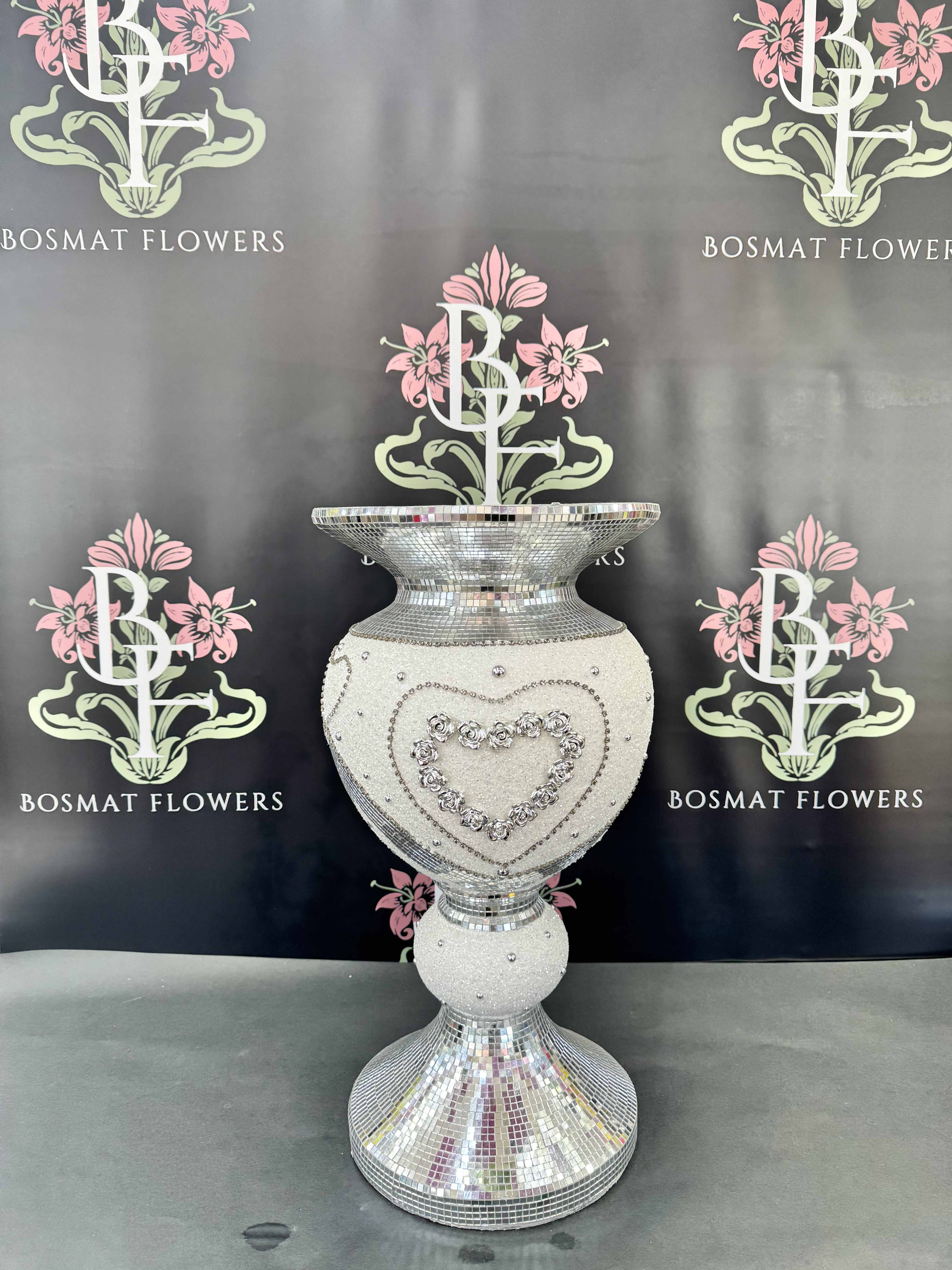 Decorative silver mosaic pedestal vase with a heart design