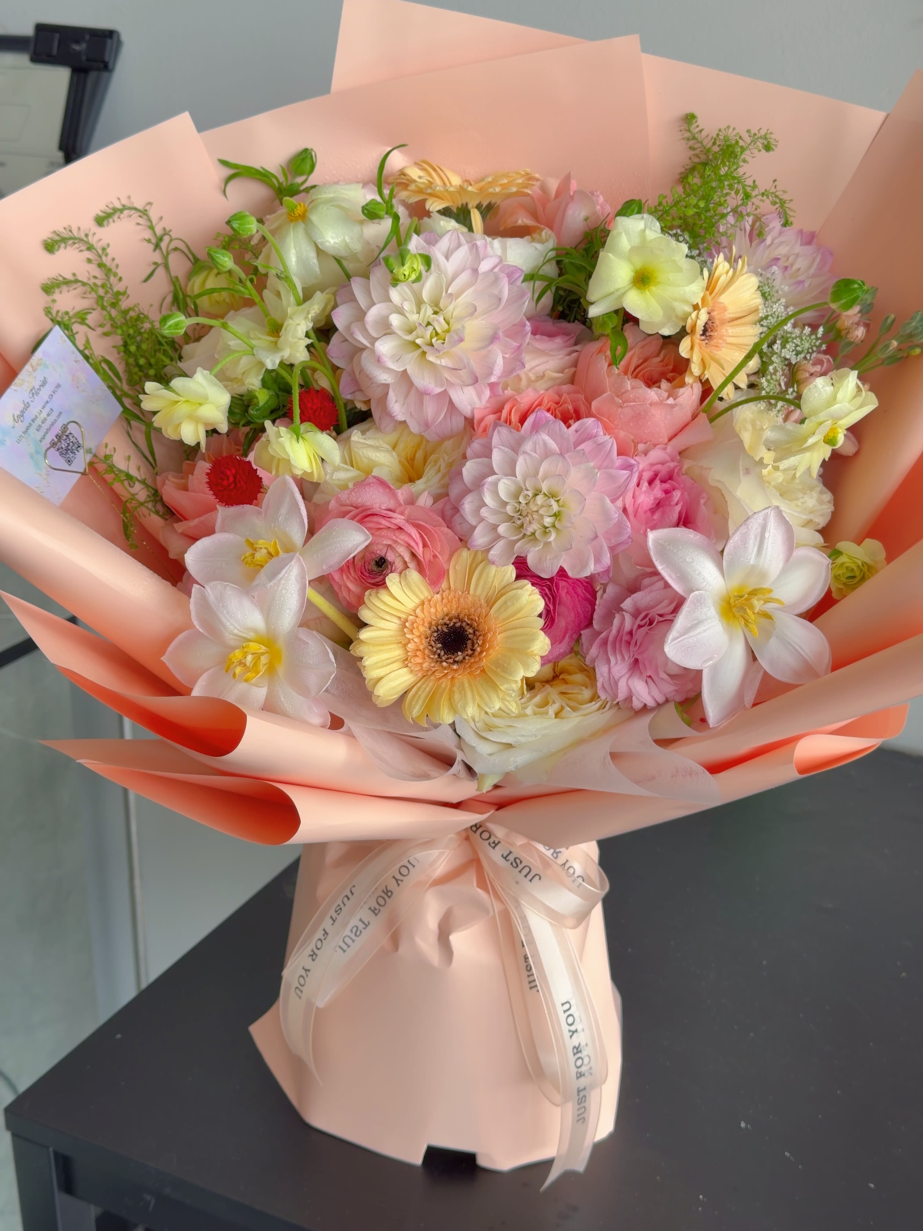Blush Garden Bouquet - A soft and elegant bouquet featuring a beautiful mix of blush pink, cream, and peach seasonal flowers. Hand-arranged with fresh blooms and delicate greenery, it brings a romantic garden feel to any occasion.  Perfect for birthdays, celebrations, or simply brightening someone’s day.