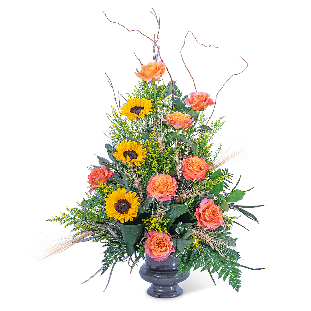 Orange roses and sunflowers in a dark vase