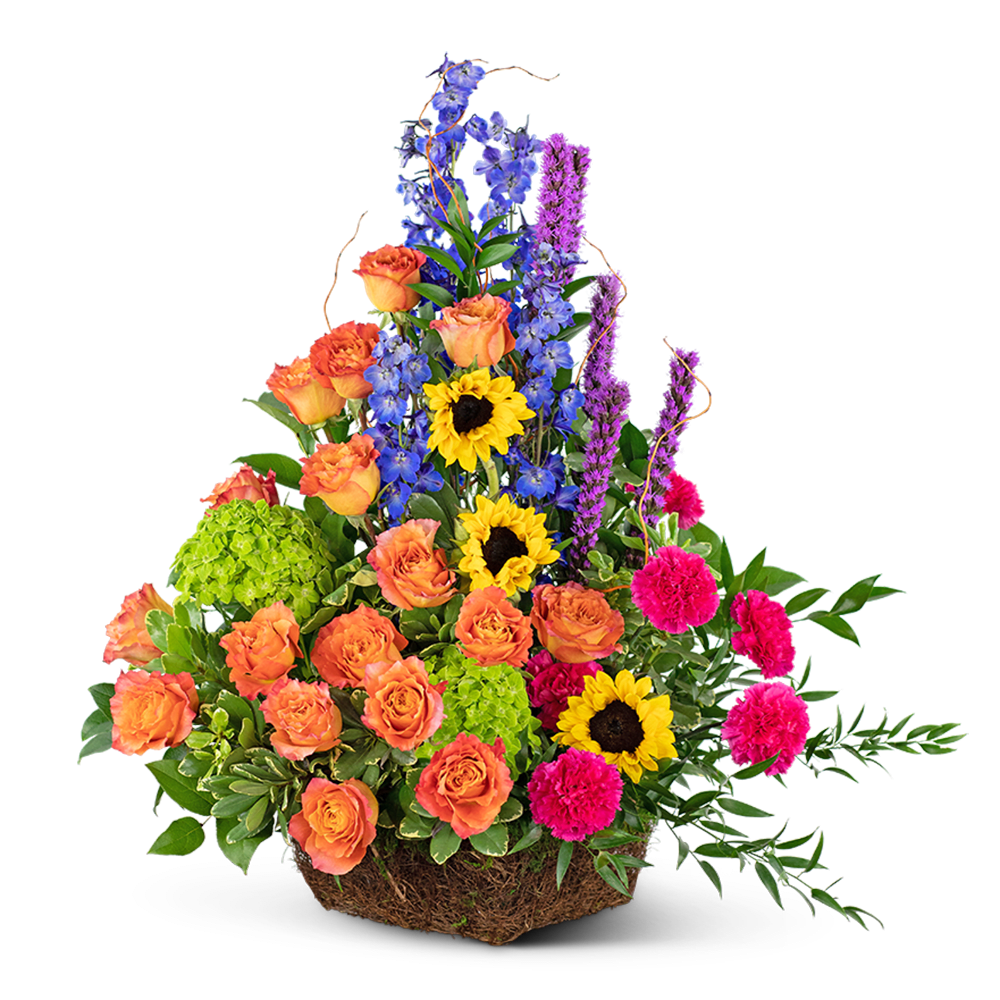 Mixed bouquet with orange roses, sunflowers, blue delphinium, and pink carnations in a basket