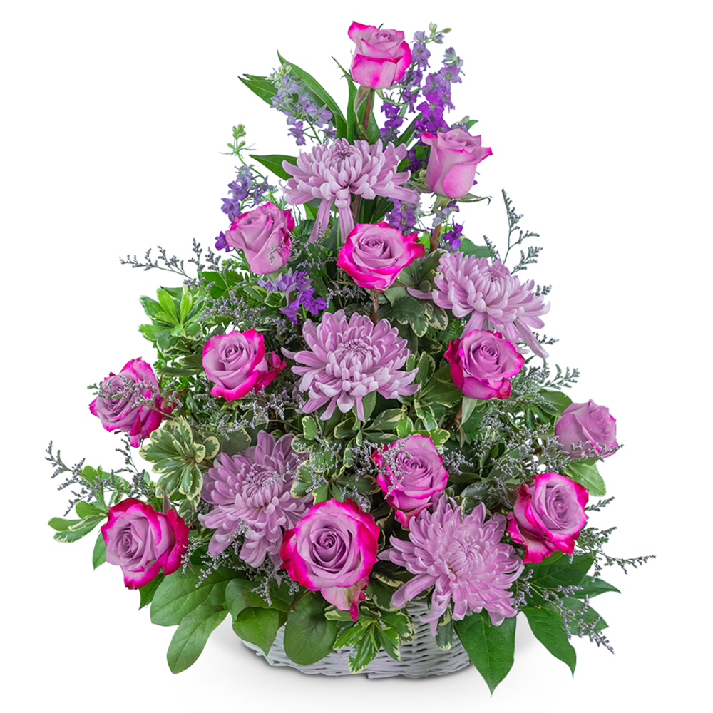 Pink roses and lavender chrysanthemums in a white basket