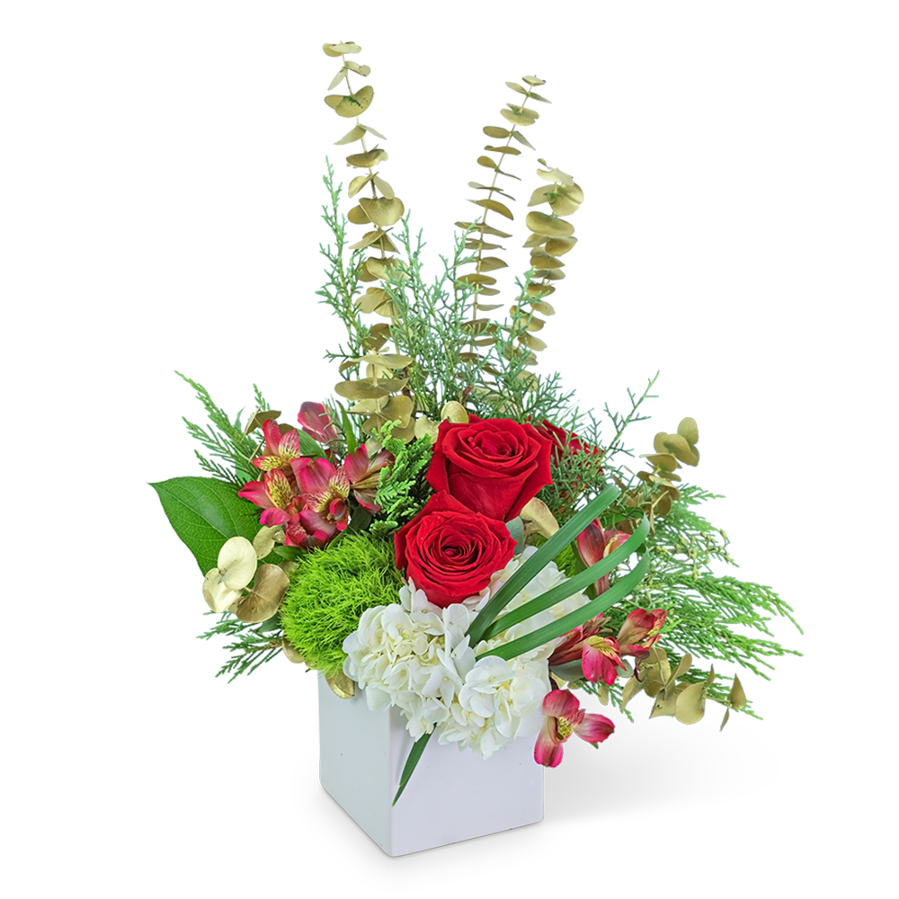 Red roses and white hydrangeas in a white box with mixed greenery