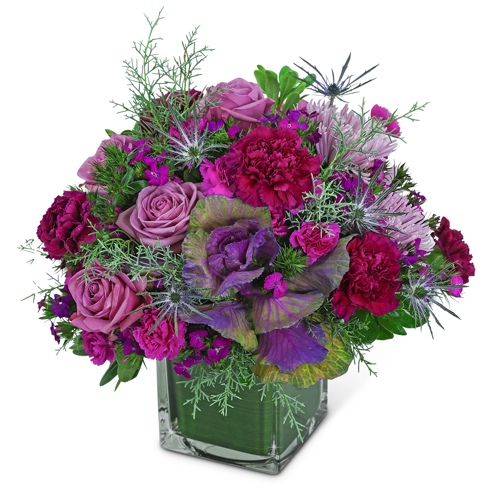 Wildberry Luxe - This artistic flower design will brighten anyone’s day! Wildberry Luxe contains roses, spider mums, carnations, and dianthus accented with a variety of winter foliage. This unique flower arrangement is truly fresh and fabulous and will add a purple pop of color to anyone's home or office. Send these beautiful flowers to celebrate a birthday, anniversary, or any occasion. We offer same-day flower delivery in most cases.