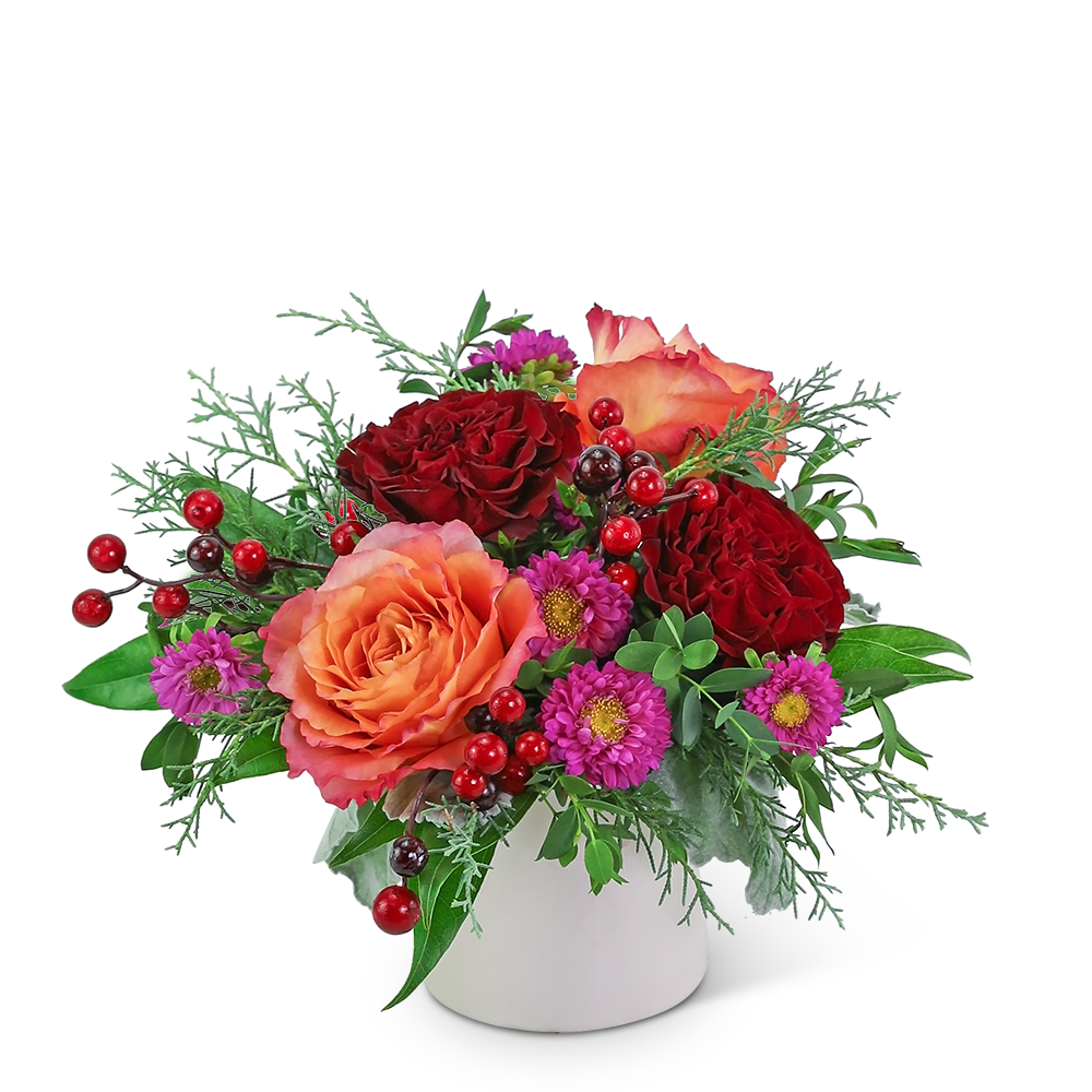 Luminous Winter - The vibrant colors in this arrangement are sure to brighten up any space. Luminous Winter features premium roses, Matsumoto Asters, and the perfect touch of winter foliage. This non-traditional winter flower design is the perfect holiday flower arrangement for a gift or just to add fresh flowers to your holiday home decor. We specialize in local flower delivery and take pride in our unique flower designs and excellent customer service.