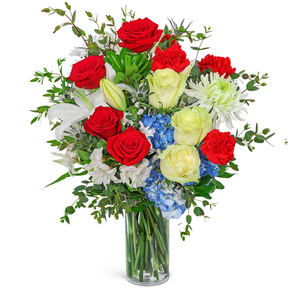 Bouquet of red and pale yellow roses with white lilies in a glass vase
