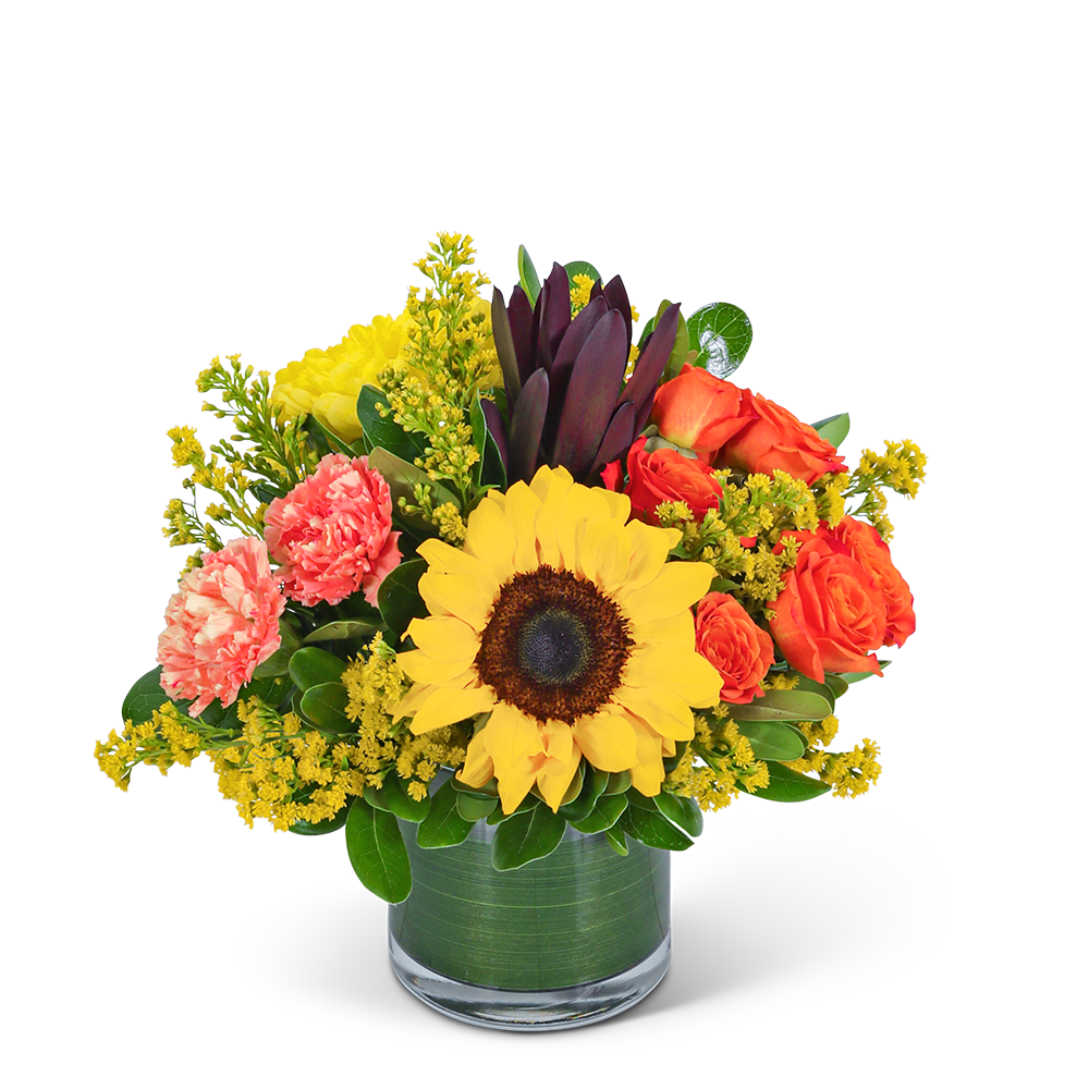 Sunflower and orange rose bouquet in a glass vase