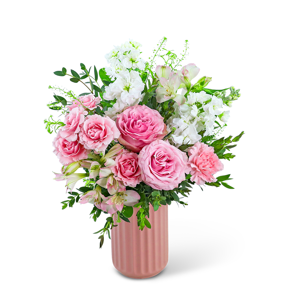 Pink roses and white flowers arranged in a pink vase