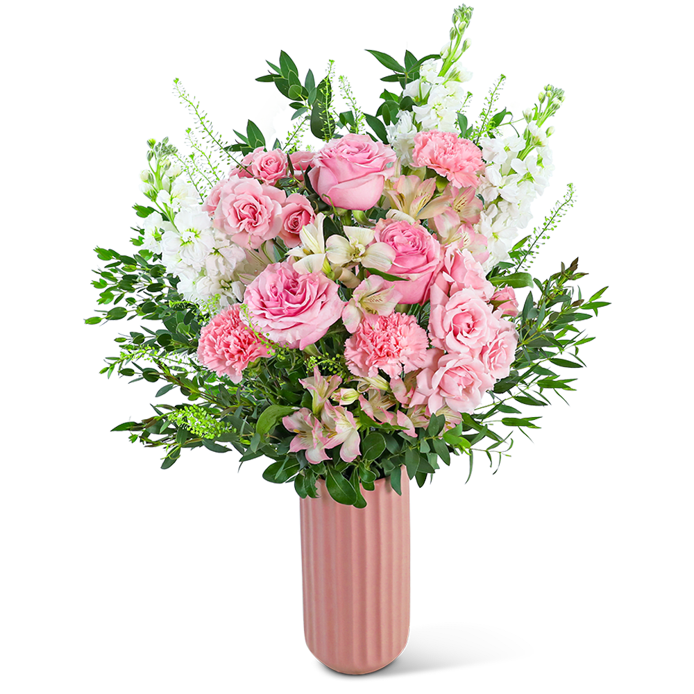 Pink roses and carnations in a tall pink vase