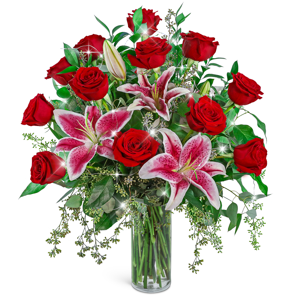 Starlit Love Story with LED Twinkle Lights - Embrace the enchanting allure of love with Starlit Love Story, a mesmerizing floral arrangement featuring a mix of roses, lilies, and premium foliage in a sleek and modern vase, adorned with delicate fairy lights. There's nothing more romantic than sending roses, and this exquisite bouquet serves as the perfect gift to celebrate an anniversary or to express your love in a captivating and elegant way.