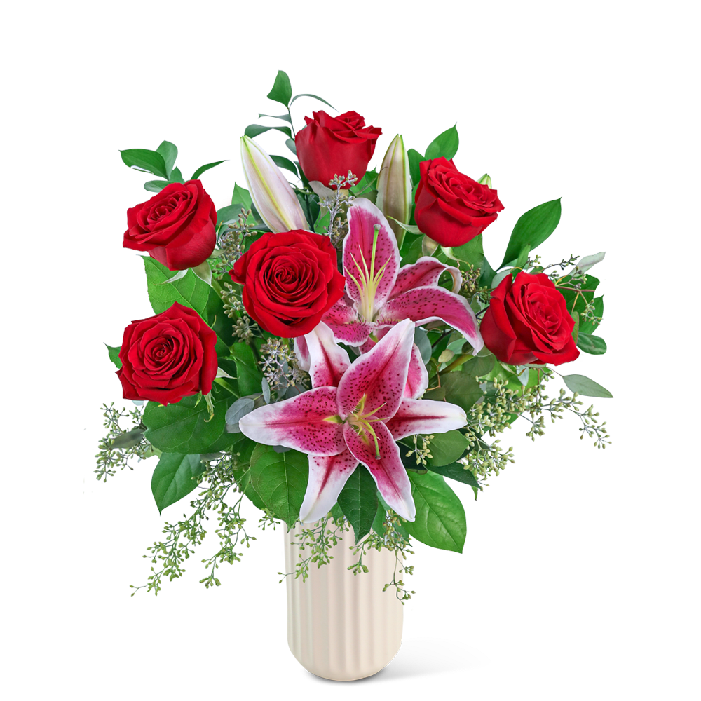 Red roses and pink lilies in a white vase