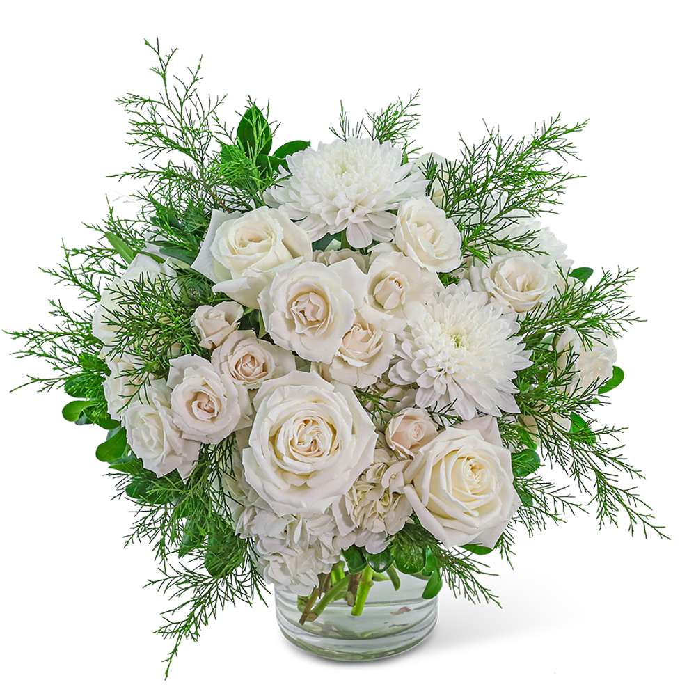 White roses and chrysanthemums in a clear glass vase