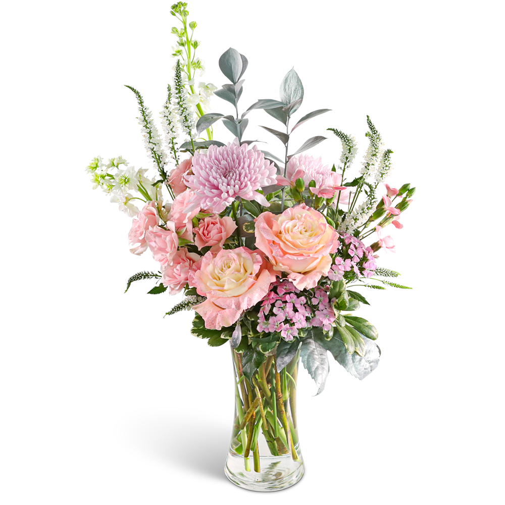Pink roses and chrysanthemums in a clear glass vase