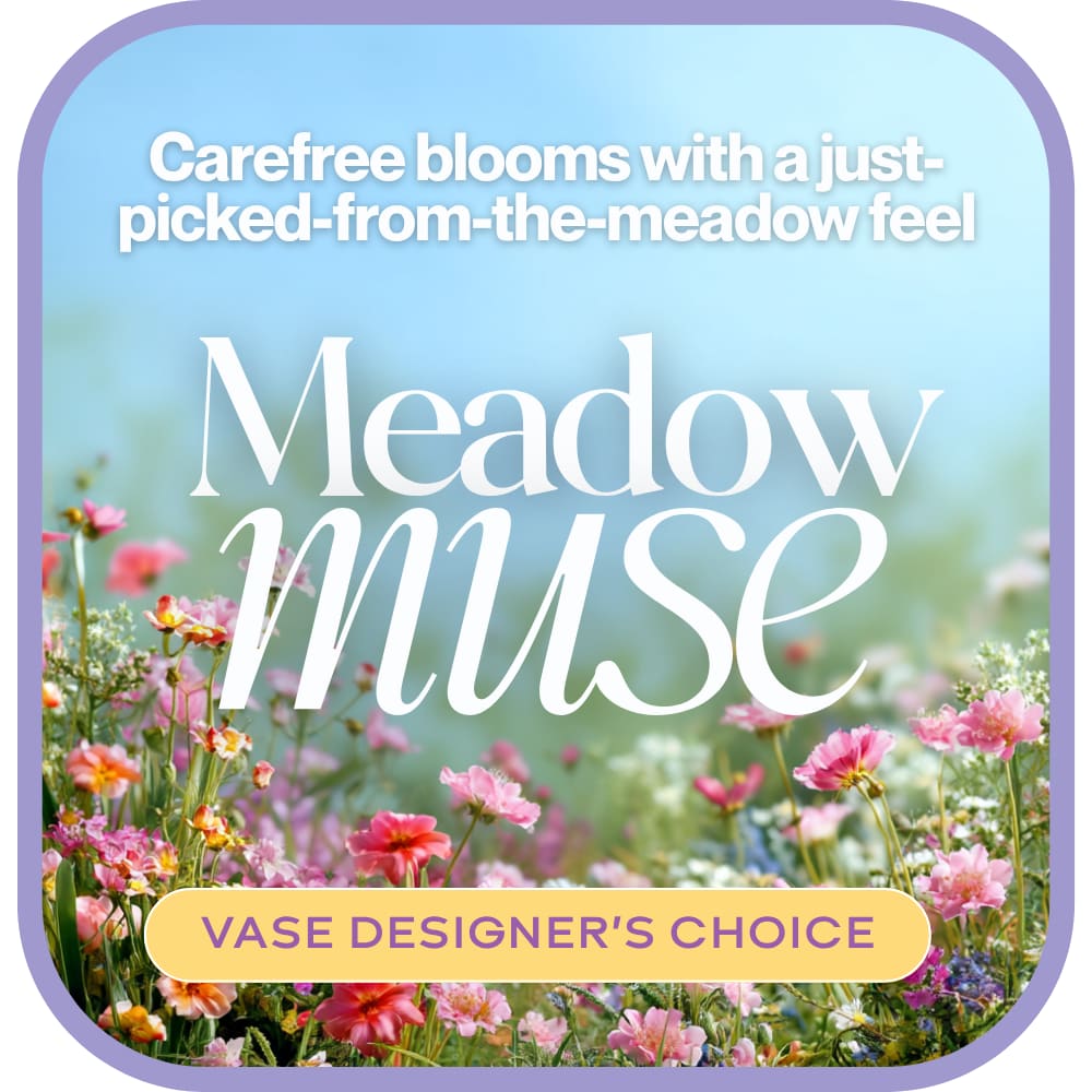Meadow Muse - Designer's Choice - Our Meadow Muse Designer's Choice brings a carefree, just-picked-from-the-meadow vibe to any space. Designed in a vase with fresh, seasonal flowers by your local florist, it's wild, whimsical, and full of charm. Flower varieties may vary, but the natural, garden-fresh feel always shines through.