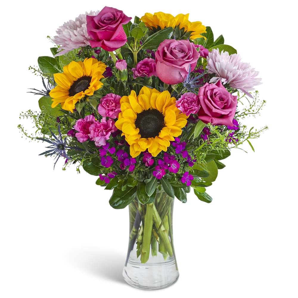 Joy in Bloom - Joy in Bloom features roses, sunflowers, cremon, carnations, eryngium, dianthus, and premium foliage arranged in a clear glass vase. This bright, cheerful design is perfect for flower delivery from your local florist. Flower varieties and colors may vary slightly based on availability while the overall style remains true to the design.