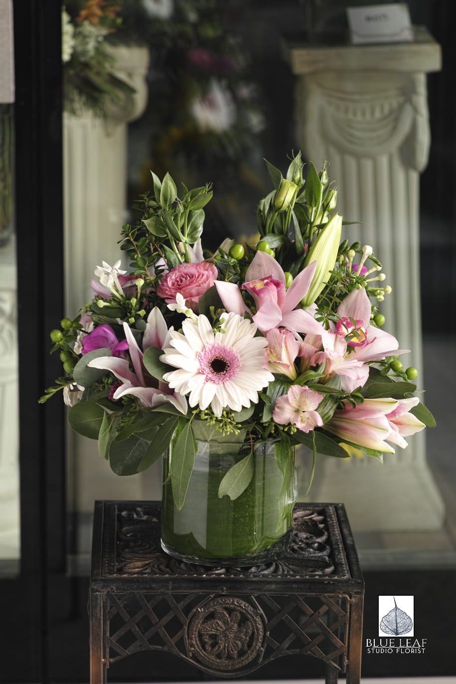 Pink and white mixed bouquet in a glass vase
