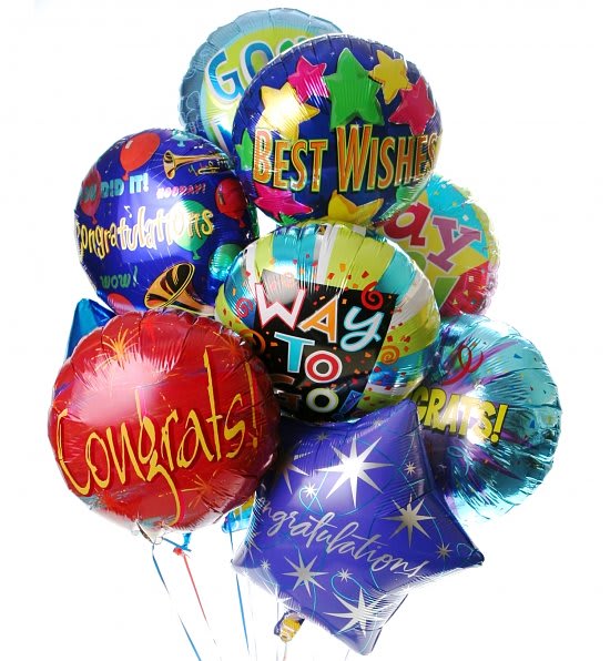 Bouquet of colorful foil balloons with congratulatory and best wishes messages