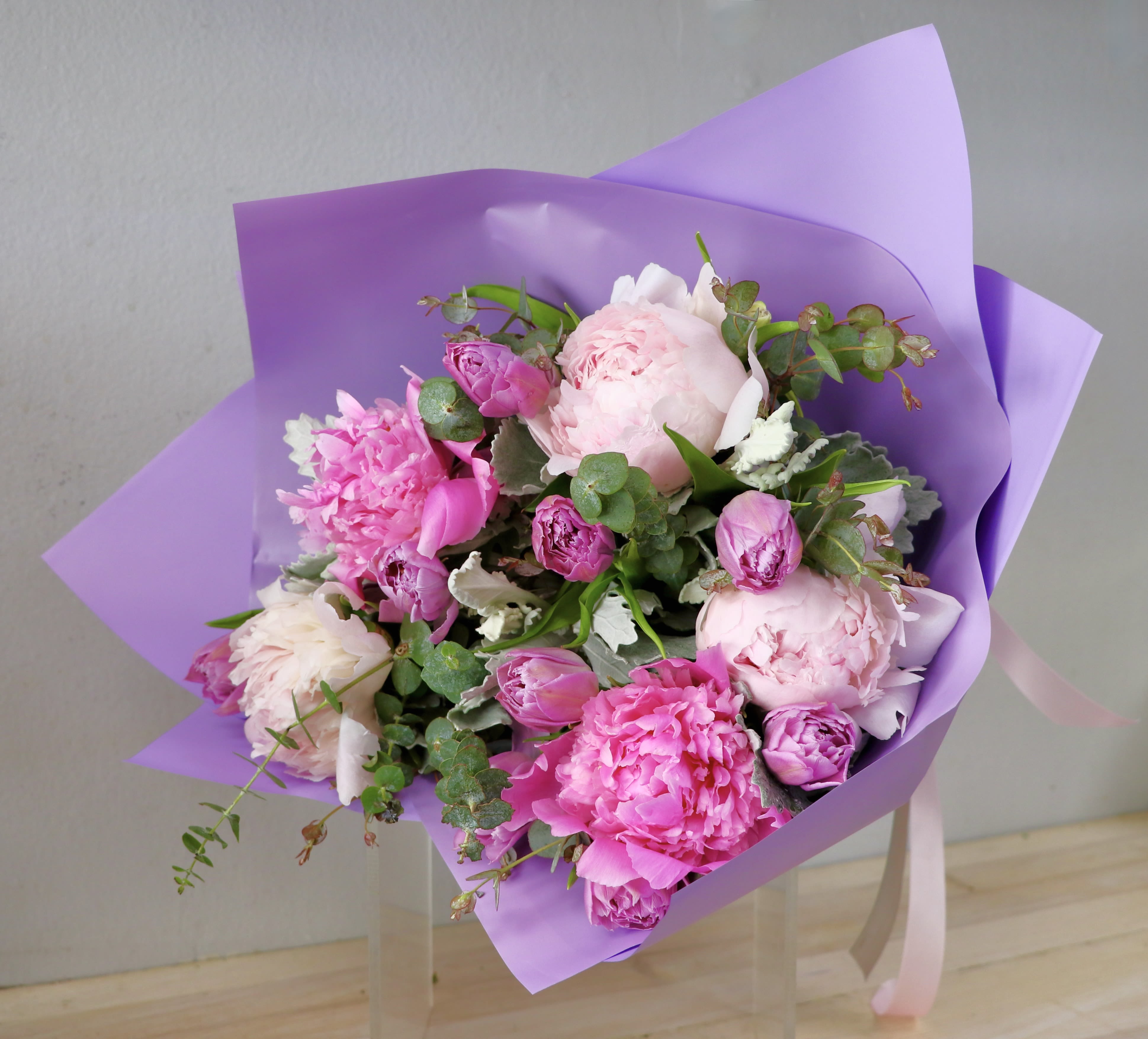 Peony &amp; Tulip Bouquet - Glendale Flowers - A breathtaking blend of romance and elegance. This stunning bouquet features a lush mix of soft blush and vibrant magenta peonies, nestled alongside charming double-petaled tulips. 