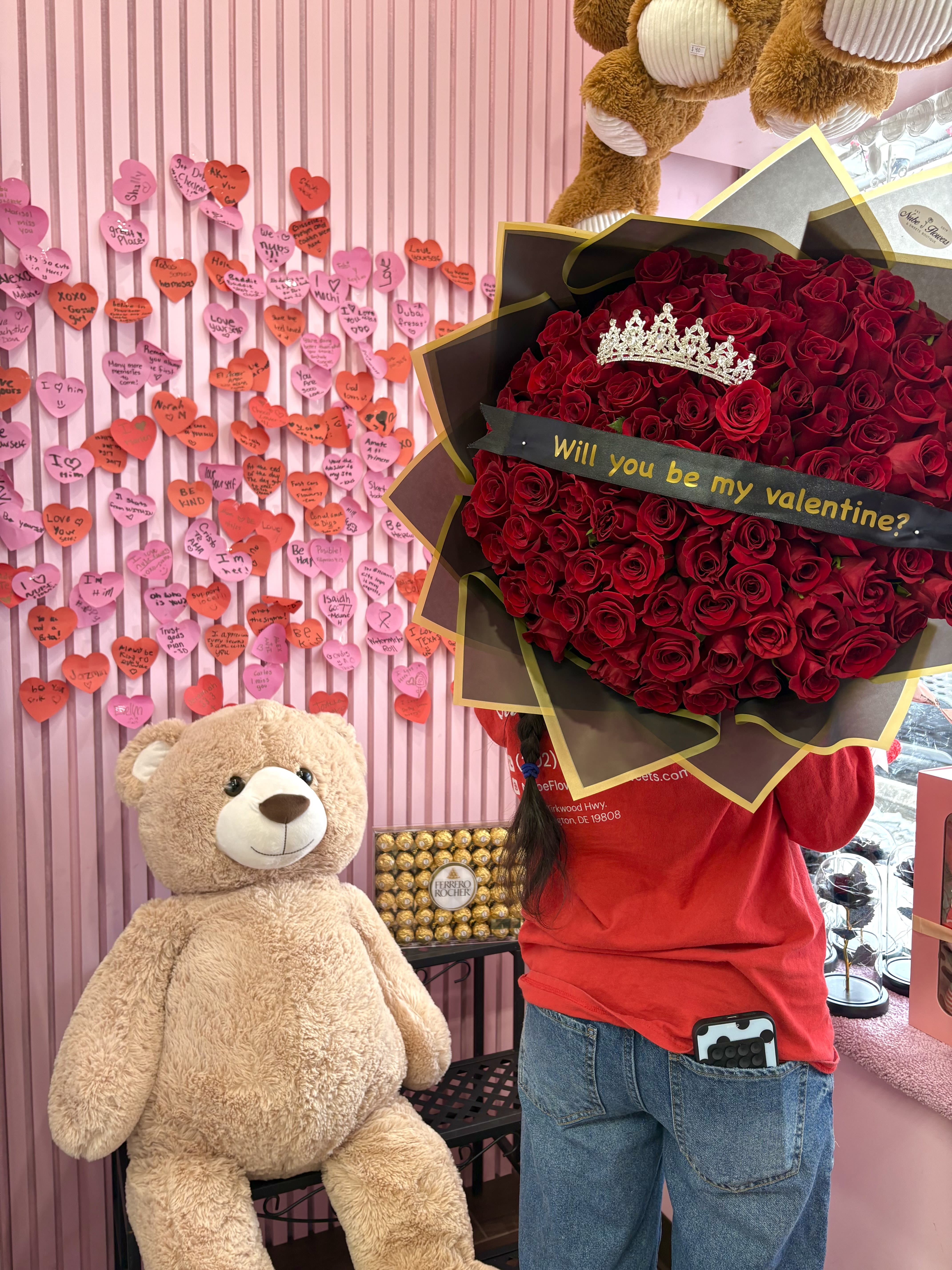 Large bouquet of red roses with a tiara and Valentine message ribbon