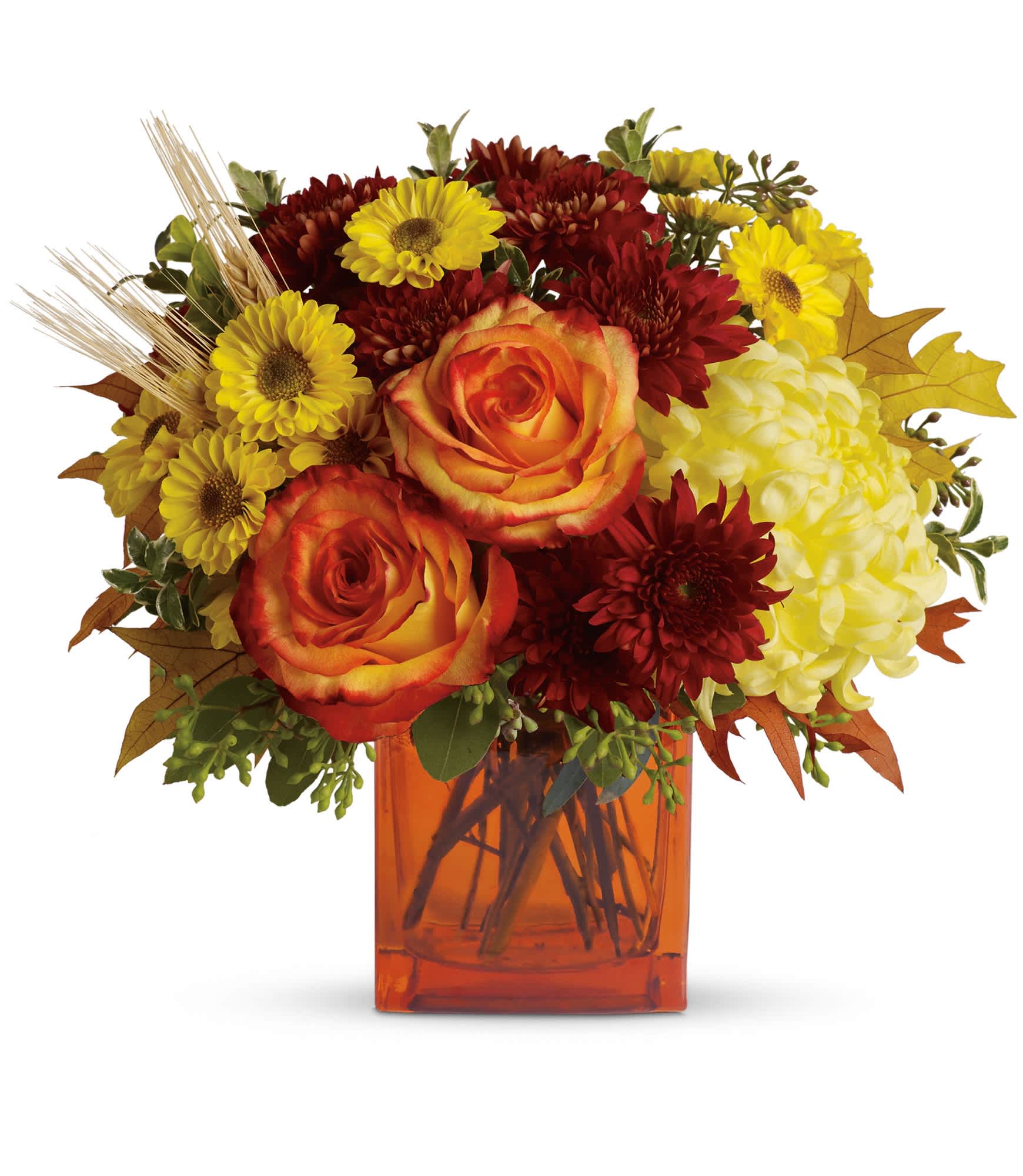 Bouquet of orange roses, yellow daisies, and red mums in an amber vase