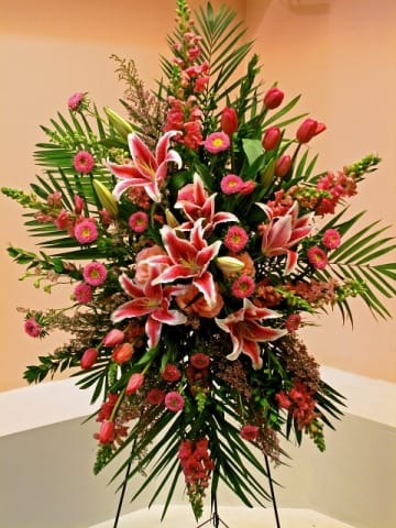 Tall floral standing spray with pink lilies and tulips