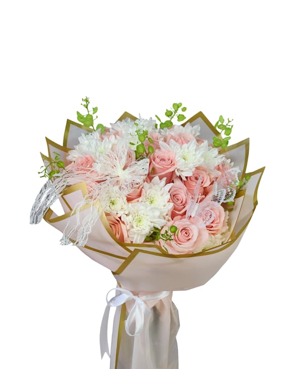 Pinky Promise Cello - Soft, romantic, and timeless, this hand-tied bouquet features delicate pink roses paired with fresh white blooms and lush greenery, all beautifully wrapped in elegant designer paper with subtle accents. Please note, this bouquet does not come with a vase. The stems will be carefully wrapped in a moisture-retaining sponge to keep the flowers fresh for a few hours, making it perfect for gifting before placing in water at home. 