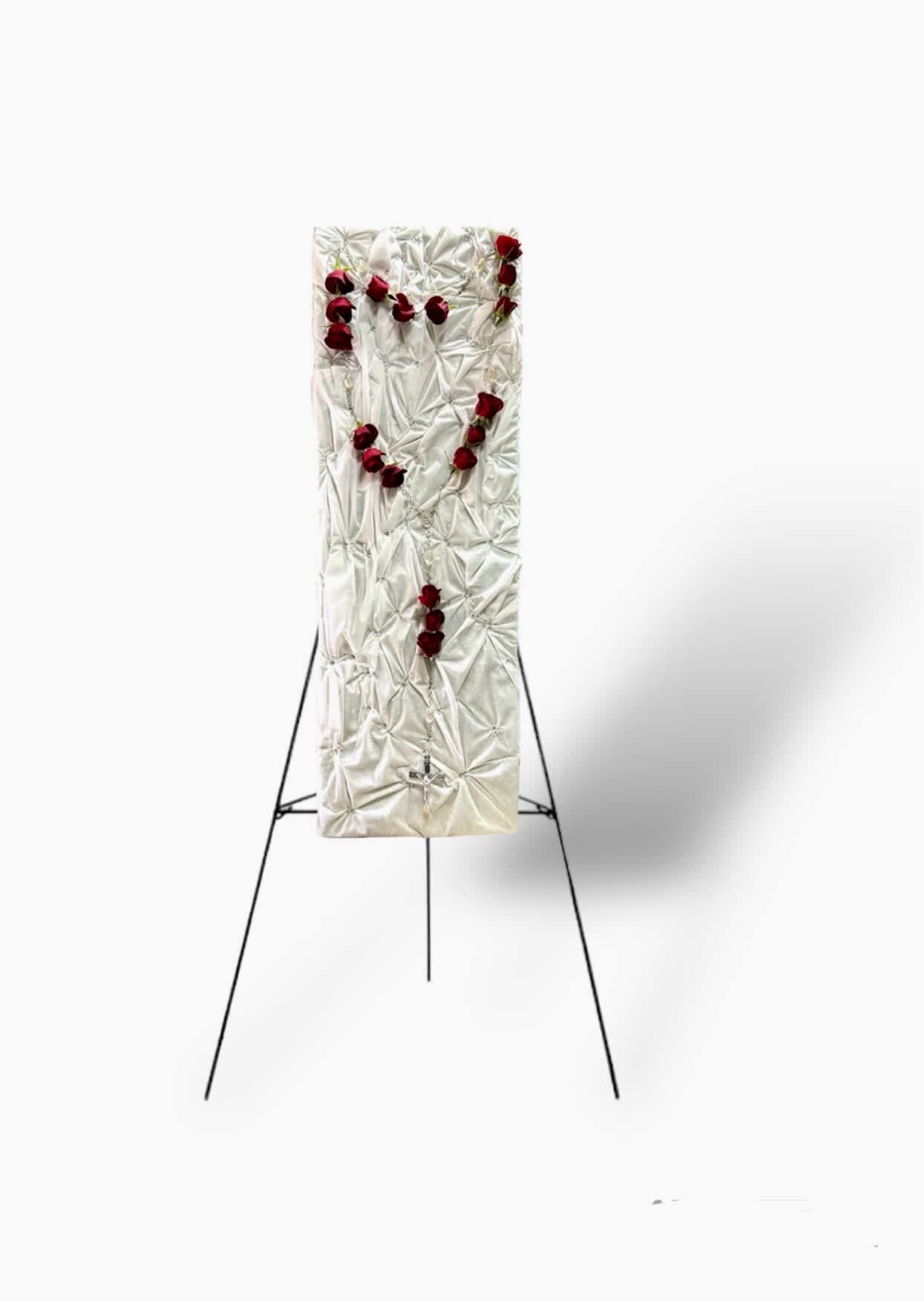 White funeral easel spray with red roses on a stand
