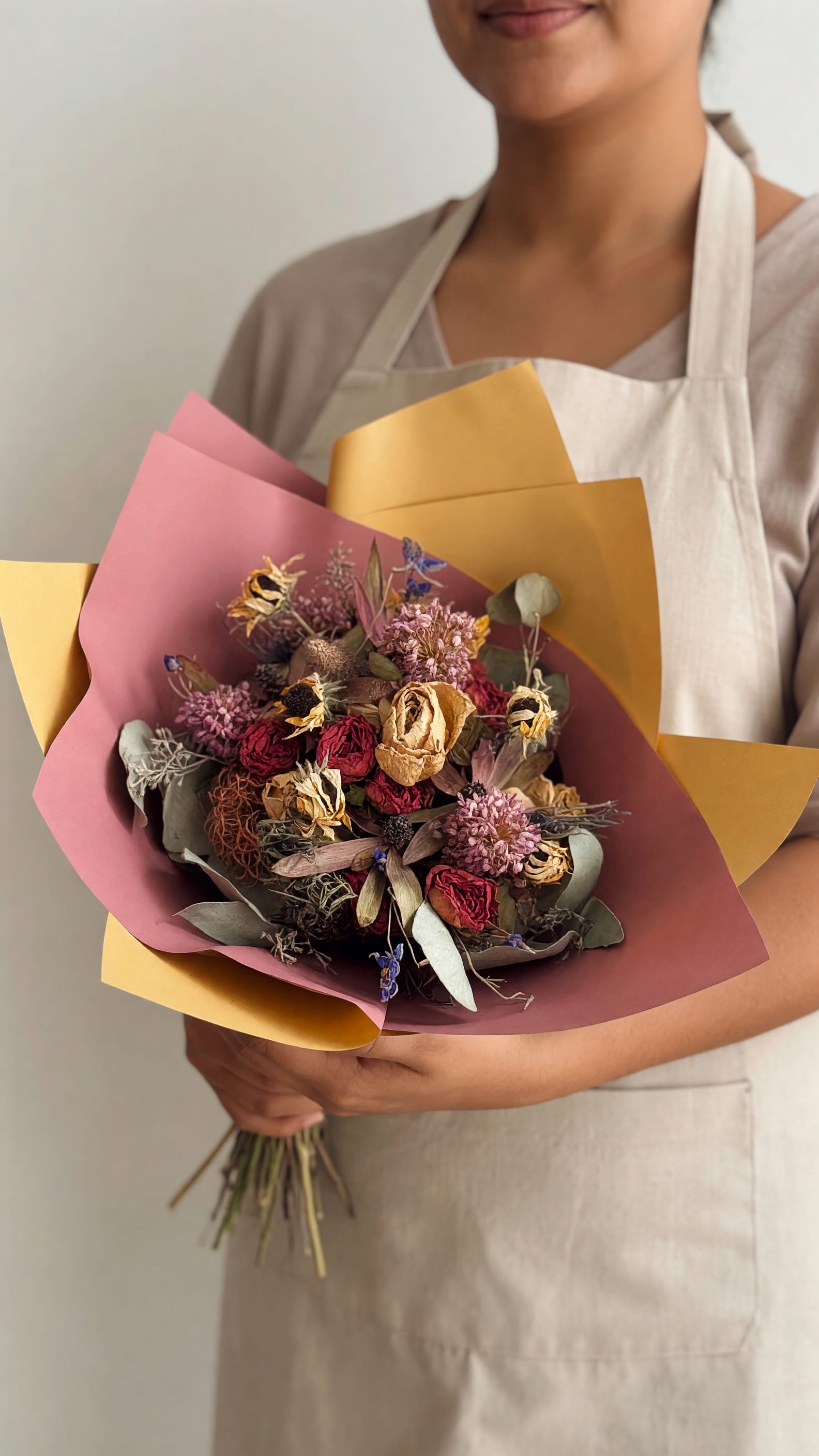 Sun Kissed Dried Bouquet - A romantic, rustic mix of dried roses and textured blooms, this Sun Kissed Dried Bouquet makes a timeless anniversary bouquet or just-because gift for someone who cherishes vintage charm.