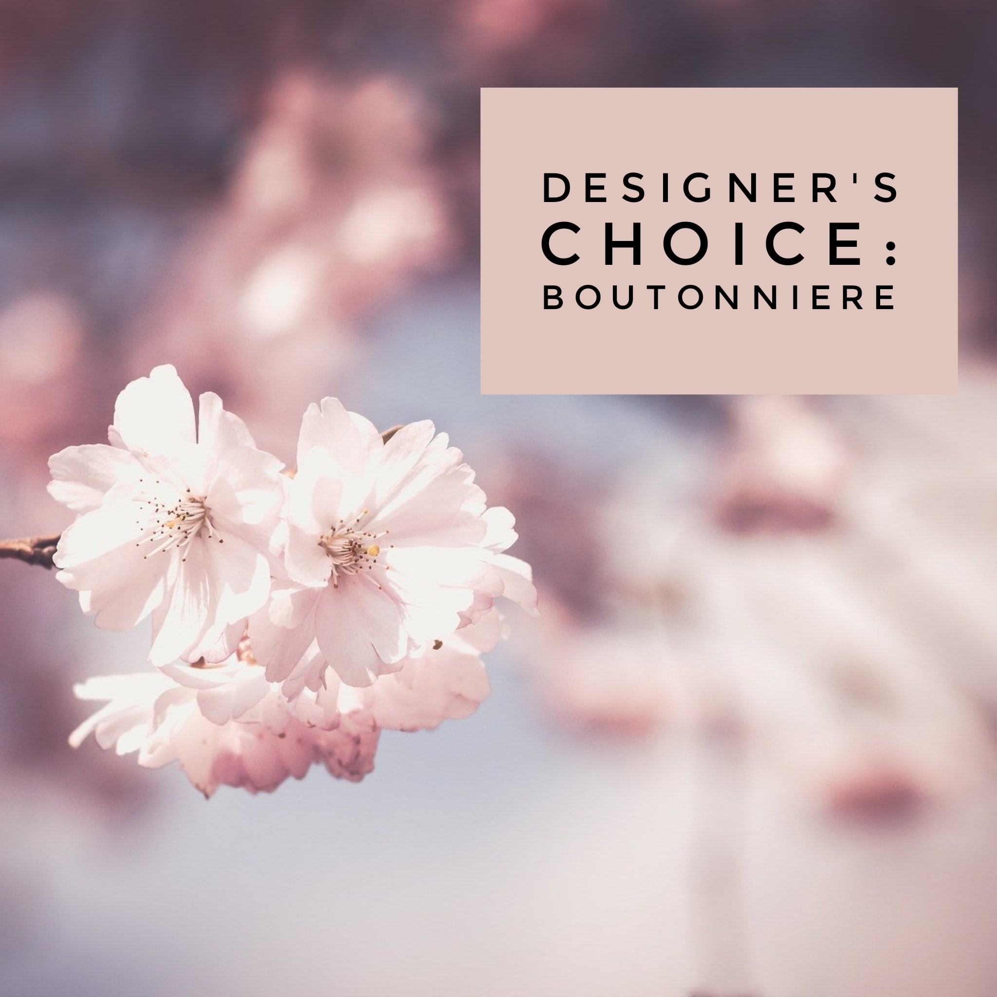 Pink blossoms with a text box reading designer's choice boutonniere