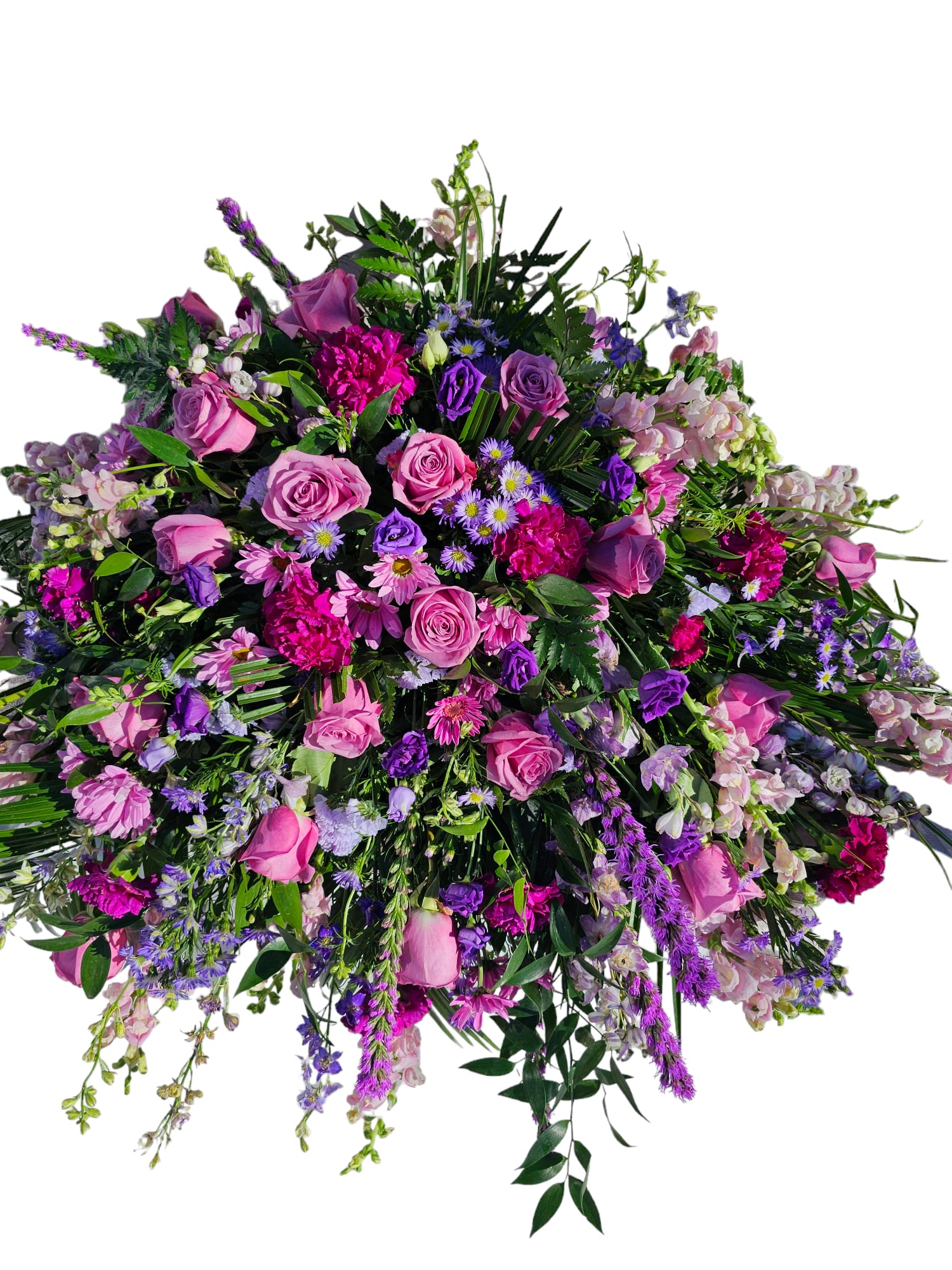 Large bouquet of pink and purple flowers with cascading blooms