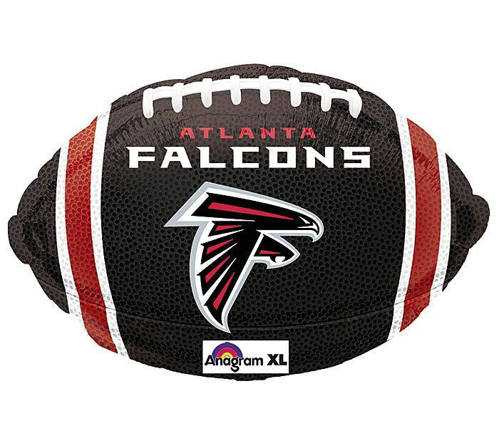 18" Atlanta Falcons Football Mylar - Celebrate game day with an 18-inch football-shaped foil balloon featuring bold Atlanta Falcons branding-perfect for a birthday, game-day party, or any fan-themed celebration. The black textured surface with red and white accents and realistic laces gives this foil balloon a sporty, high-energy look that will make the recipient feel like the team is right there with them.  This 18" Mylar balloon has the Falcons logo centered prominently for instant team pride and comes ready to float as a standout single-piece decoration or paired with bouquets and party arrangements. Lightweight and eye-catching, it's an easy way to say "you're on my team" to the person you're celebrating; just inflate with air or helium at time of delivery for best effect.