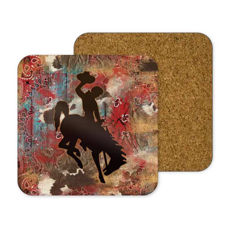 Two square cork coasters with a cowboy silhouette design