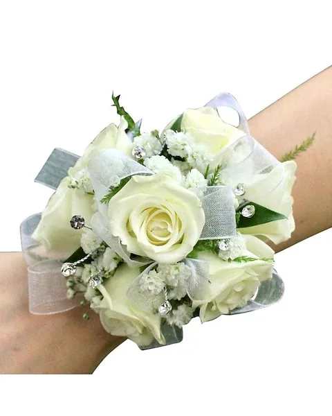 White rose wrist corsage with ribbon and rhinestone accents